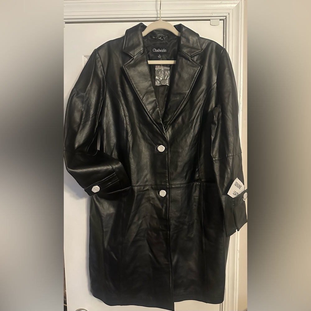 Long Black Leather coat from Chadwick’s. New with tags never worn.